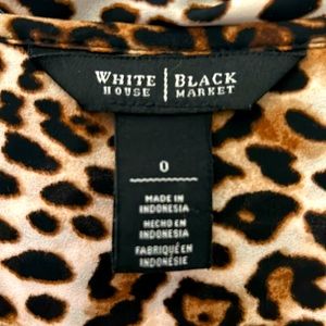 White House Black market leopard print top. Size 0
